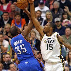 Utah Jazz power forward Derrick Favors blocks Oklahoma City Thunder small forward Kevin Durant (35) as the Utah Jazz and the Oklahoma City Thunder play NBA basketball Tuesday, April 9, 2013, in Salt Lake City.