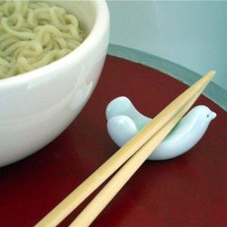 Japan-made Bird Chopstick Cradle from Black Ink, <a href="http://www.blackinkboston.com/store/show/19-0103-bird-chopstick-cradle-">$9</a>, for the Asian obsessed foodie.