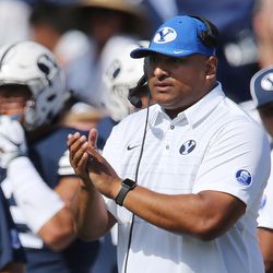 Brigham Young Cougars head coach Kalani Sitake claps after a field goal in Provo on Saturday, Aug. 26, 2017. BYU won 20-6.