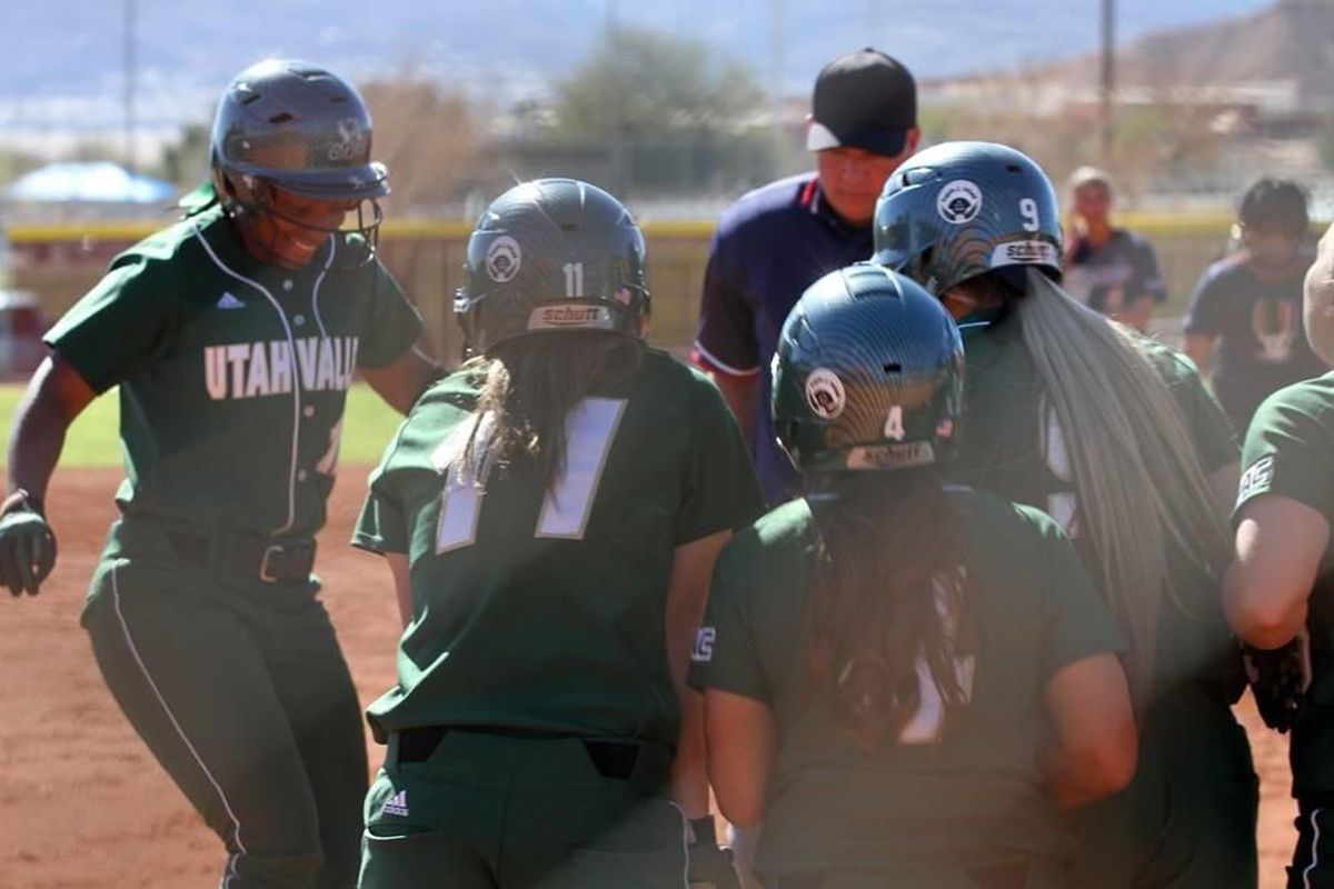 Taleigh Williams (left) gets ready to cross home plate after hitting her first collegiate home run during Sunday's win over No. 25 Cal State Fullerton in Henderson, Nevada. 