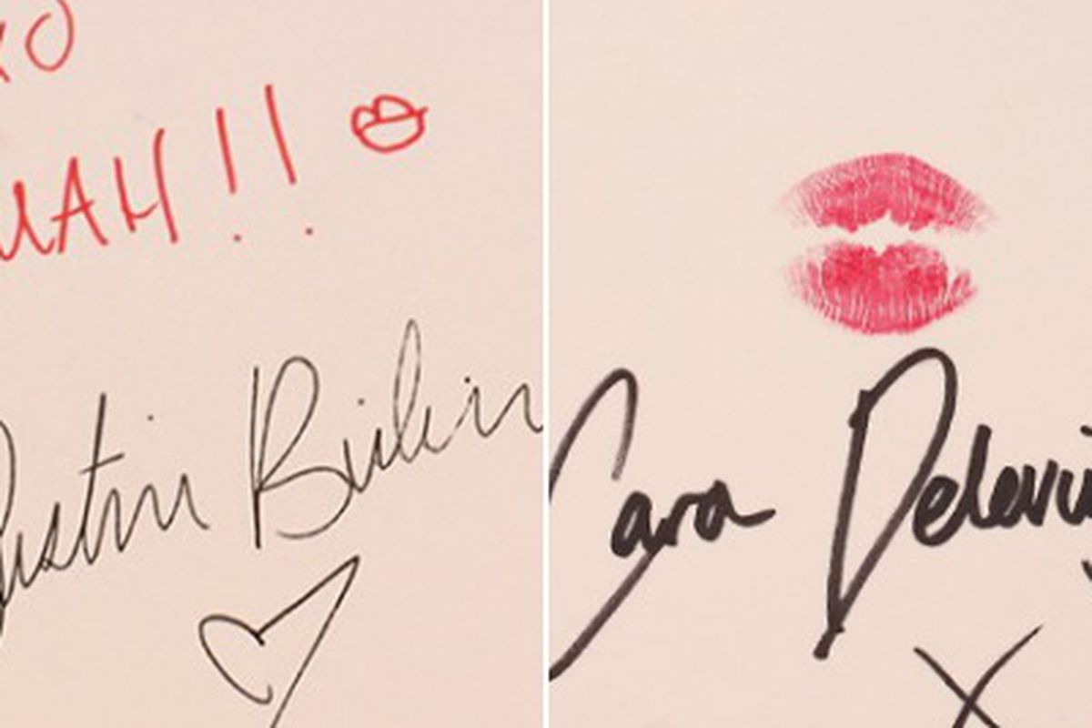 Two of the celeb kisses up for auction.