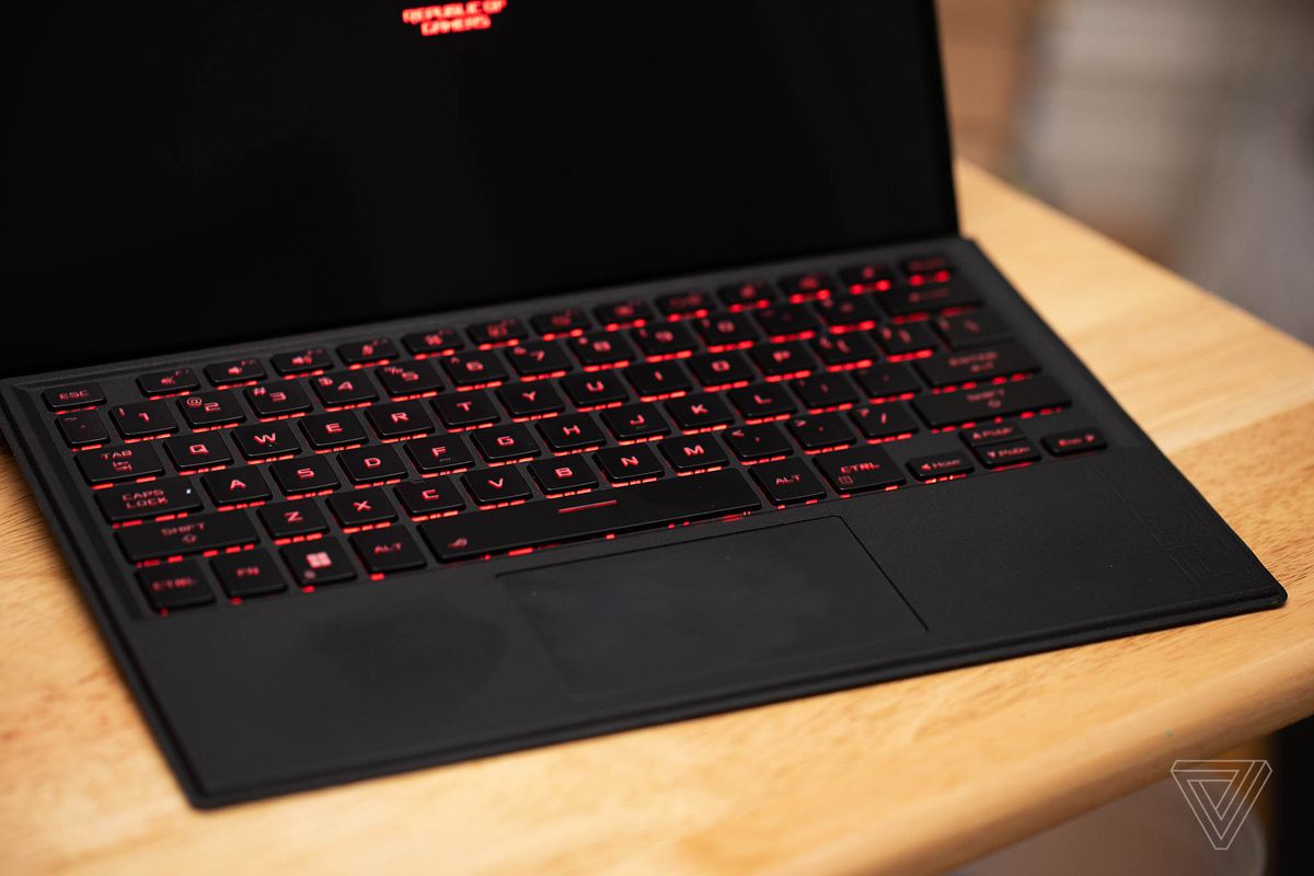 The Asus ROG Flow Z13 keyboard illuminated in red.