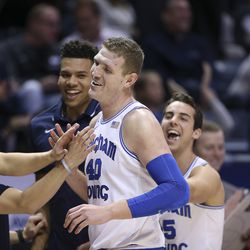 Brigham Young Cougars forward Kolby Lee (40) is congratulated after leaving the game against the San Diego Toreros with the team’s high score in Provo on Thursday, Jan. 16, 2020. BYU won 93-70.