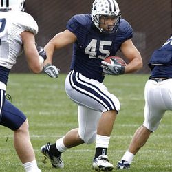 BYU running back Harvey Unga, a junior, has his eyes set on becoming the Cougars' all-time leading rusher — if he can keep from getting injured.