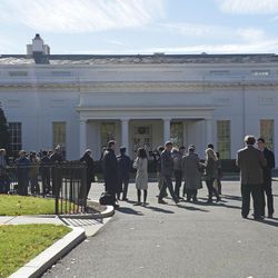 People gather outside the West Wing of the White House in Washington, Thursday, Nov. 10, 2016, as they wait for the arrival of President-elect Donald Trump to the White House for his meeting with President Barack Obama. 