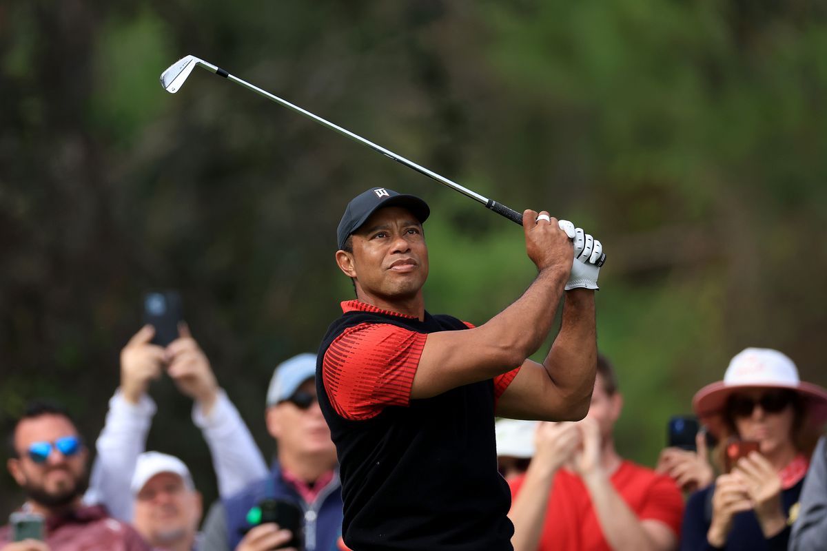 Tiger Woods of The United States plays his tee shot on the fourth hole during the final round of the 2022 PNC Championship at The Ritz-Carlton Golf Club on December 18, 2022 in Orlando, Florida.