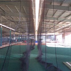 Inside batting cage building