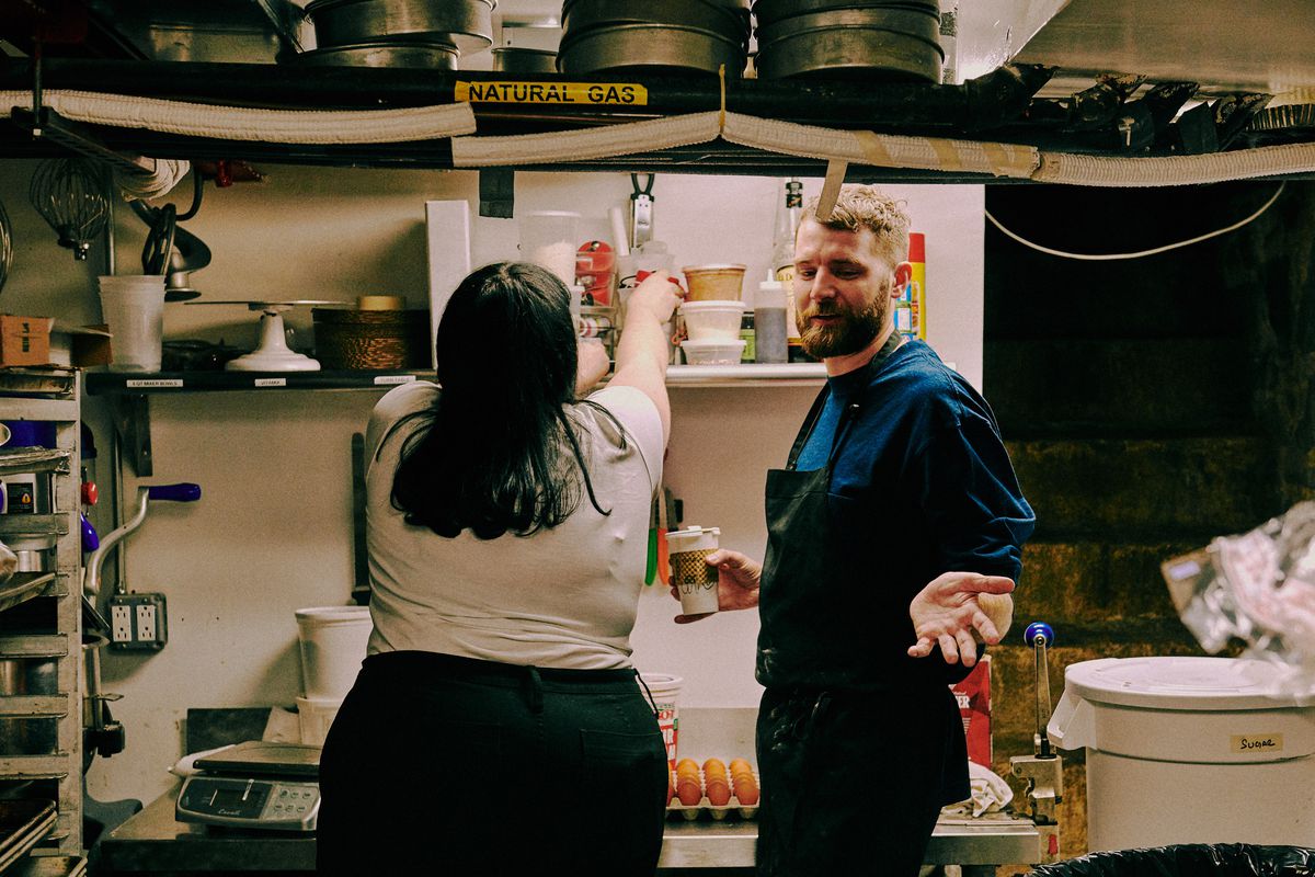 Libby Willis and Bill Clark stand together in the basement prep kitchen at MeMe’s Diner.