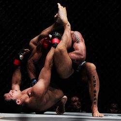 Eddie Ng tries for a submission against Arnaud Lepont
