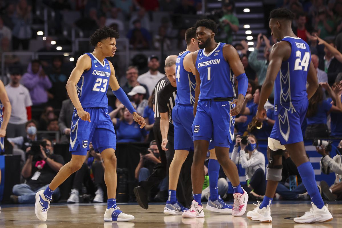 Creighton Bluejays guard Trey Alexander and forward KeyShawn Feazell and forward Arthur Kaluma celebrates during overtime against the San Diego State Aztecs in the first round of the 2022 NCAA Tournament at Dickies Arena.