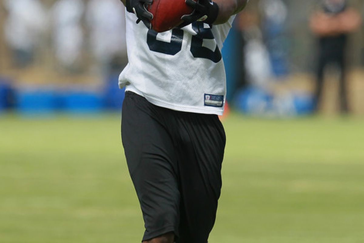 OXNARD CA - AUGUST 14:  Wide receiver Dez Bryant #88 catches a pass during Dallas Cowboys Training Camp at the Marriott Residence Inn Oxnard River Ridge on August 14 2010 in Oxnard California.  (Photo by Jeff Gross/Getty Images)