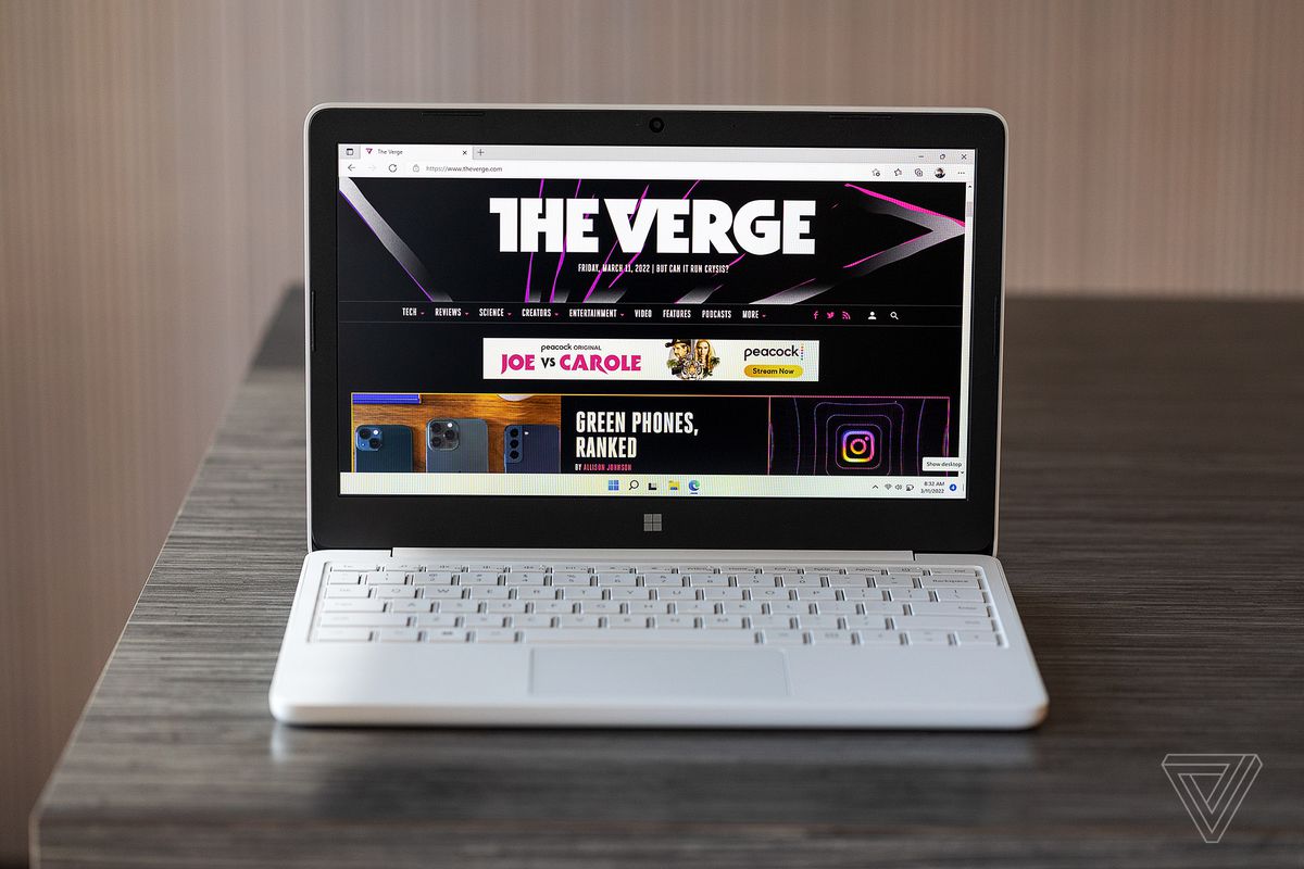 The Surface Laptop SE displaying The Verge homepage.