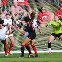 Utah's Katie Rogers (3) left, puts in the game-winner as the University of Utah defeated Texas Tech 1-0 in NCAA Tournament soccer action in Salt Lake City on Saturday, Nov. 12, 2016.