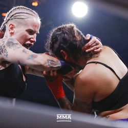 Bec Rawlings lands a right hand on Alma Garcia on Saturday night at Bare Knuckle FC inside Cheyenne Ice & Events Center in Wyoming. 