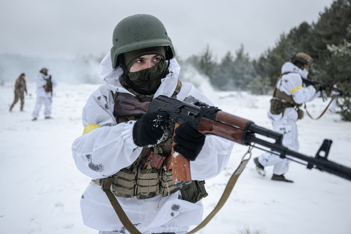 Ukrainian border guards training in snow gear.