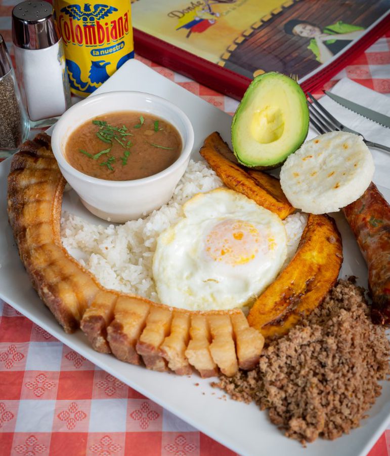 A side angle shot of a plate of Colombian comfort food.