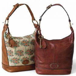 These brown handbags also have charms shaped like the classic Fossil key logo.