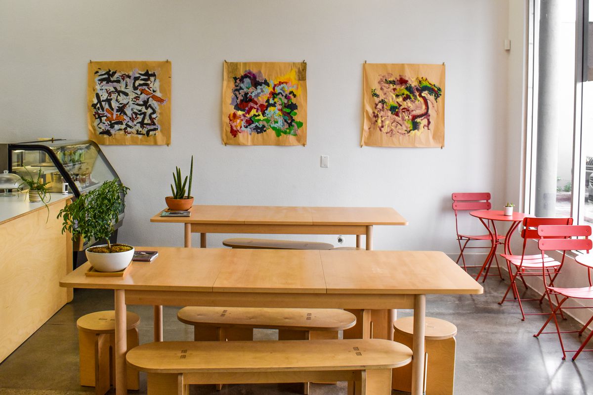 A bright, minimalist dining room of a Vietnamese restaurant in Long Beach.