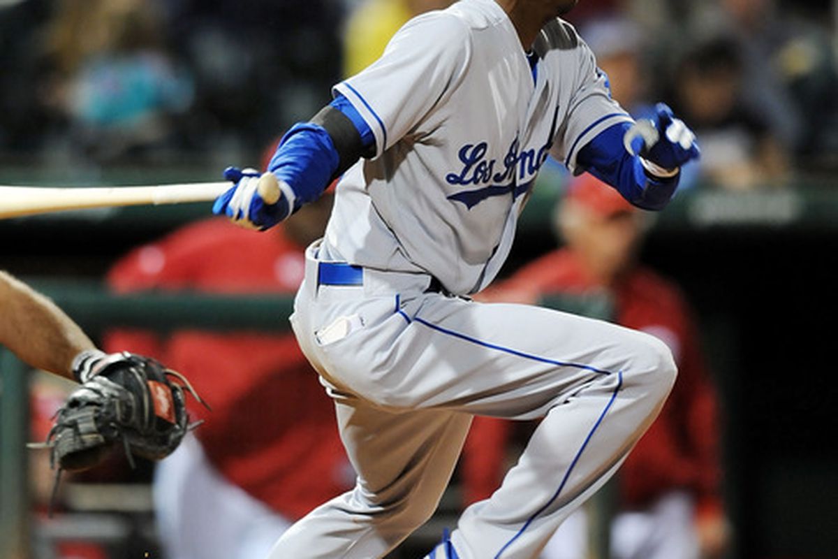 GOODYEAR, AZ - MARCH 03:  Dee Gordon #70 of the Los Angeles Dodgers follows through on a swing against the Cincinnati Reds at Goodyear Ballpark on March 3, 2011 in Goodyear, Arizona.  (Photo by Norm Hall/Getty Images)