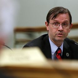 FILE - Rep. Fred Cox, R-West Valley City, speaks during a House Judiciary Committee meeting concerning HB101 at the Capitol in Salt Lake City on Wednesday, Feb. 3, 2016. The bill that backers say relieves loving families of unnecessary expenses of hiring attorneys for their disabled children in guardianship proceedings is before the Utah House of Representatives. Critics say HB101 could abridge potential wards' rights.