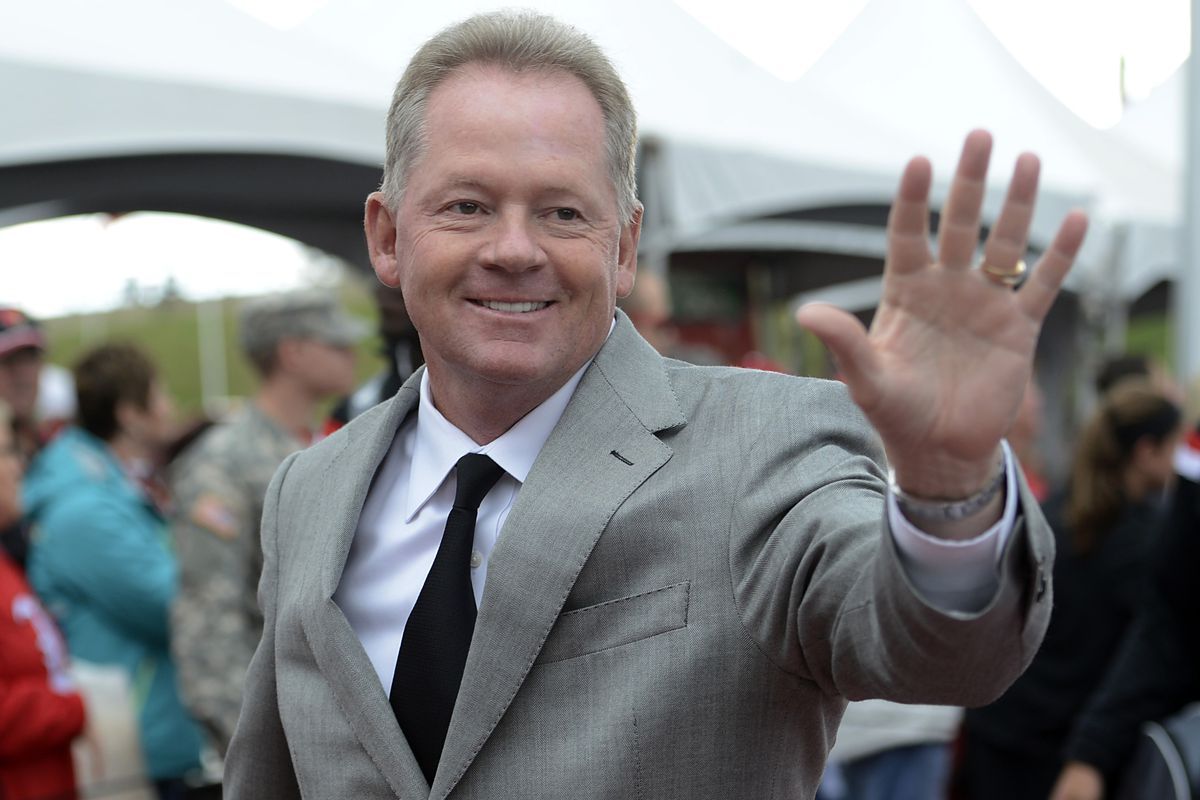 Why is Bobby Petrino smiling? Because it's raining wide receiver commitments. 