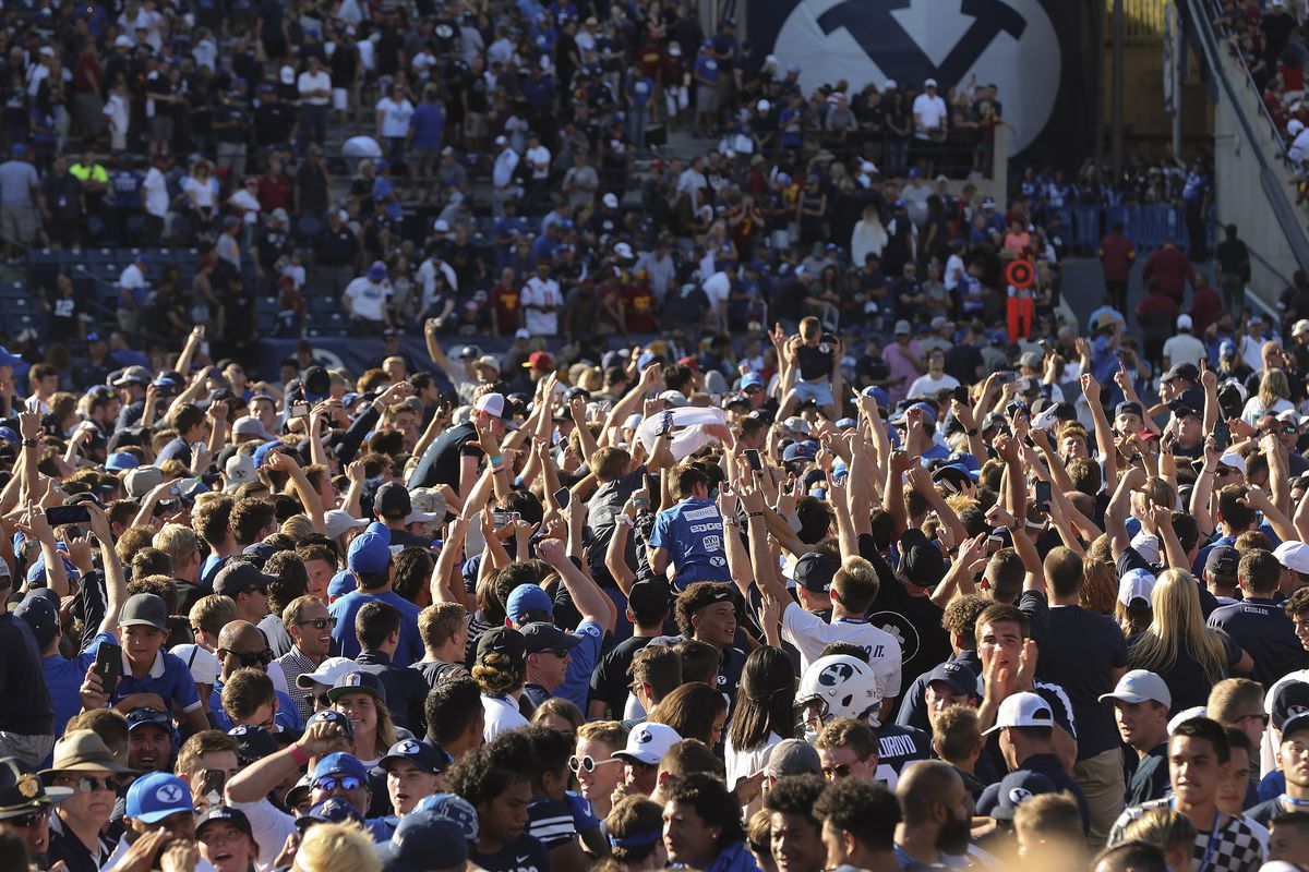 BYU fans storm the field after BYU beat USC in Provo on Saturday, Sept. 14, 2019. BYU won 30-27 in overtime.