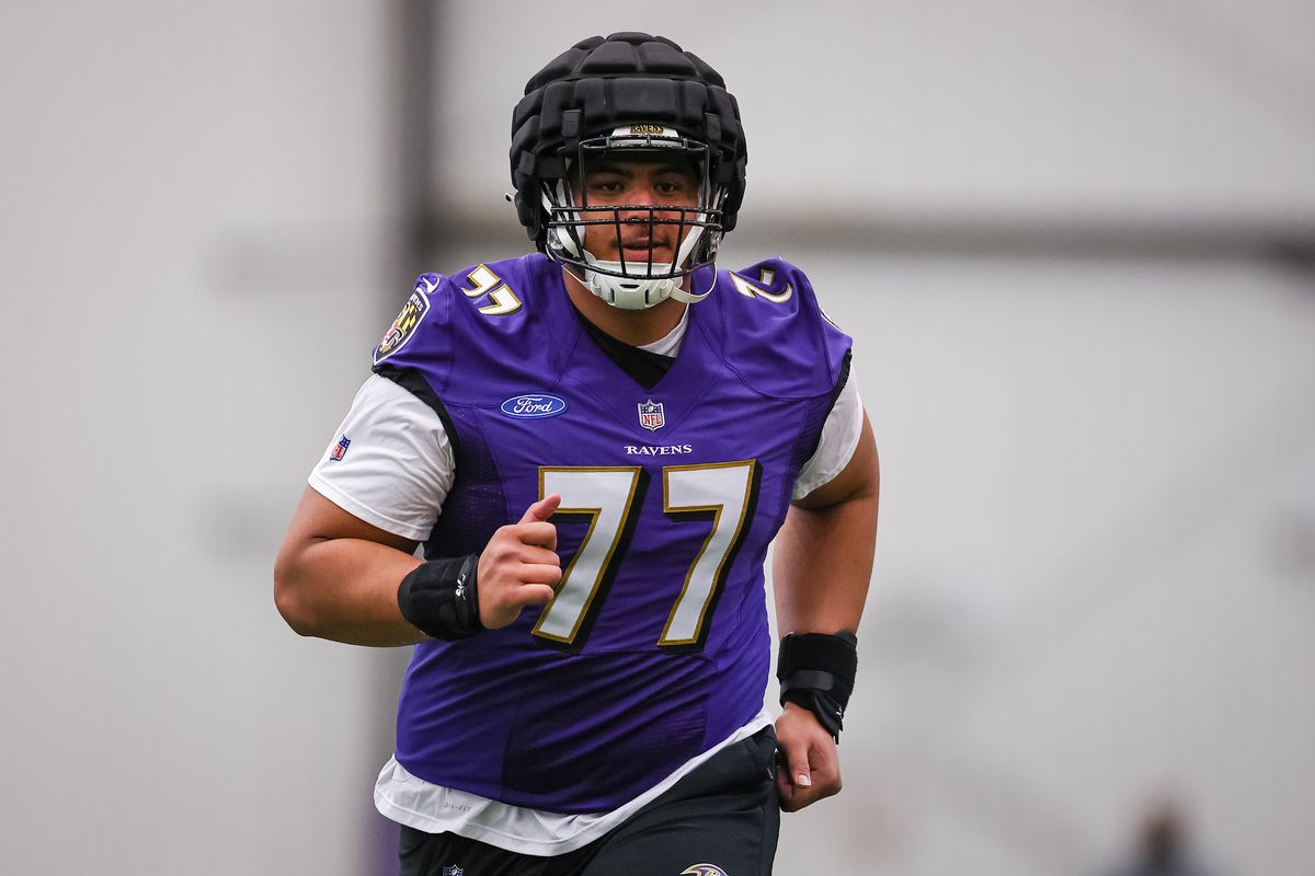 Baltimore Ravens offensive tackle Daniel Faalele plays against the