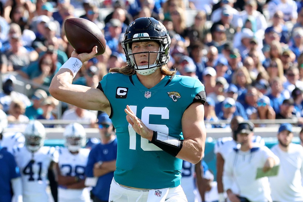 Trevor Lawrence #16 of the Jacksonville Jaguars attempts a pass during the game against the Indianapolis Colts at TIAA Bank Field on January 09, 2022 in Jacksonville, Florida.