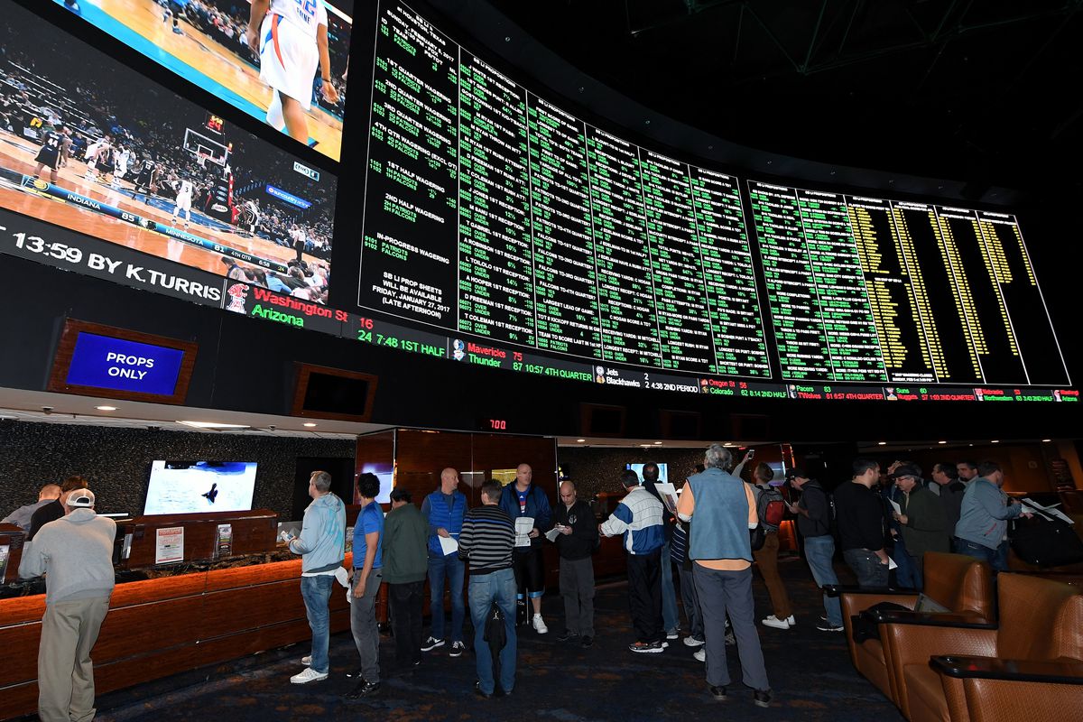 Bettors line up at the Race &amp; Sports SuperBook at the Westgate Las Vegas Resort &amp; Casino in Las Vegas, Nevada to place wagers on Super Bowl 51 between the Atlanta Falcons and the New England Patriots