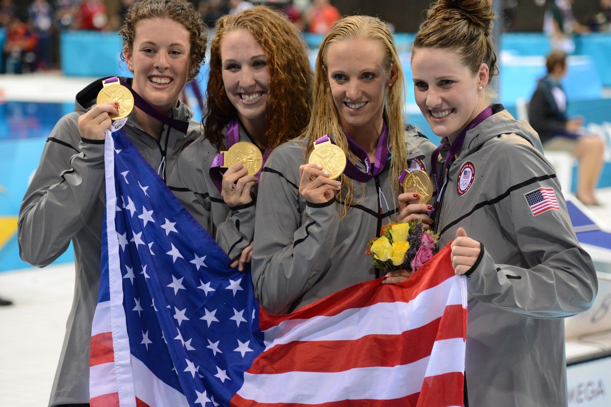 Georgia's Allison Schmitt, left, and Shannon Vreeland, second from left, were golden in the 4x200m freestyle relay.