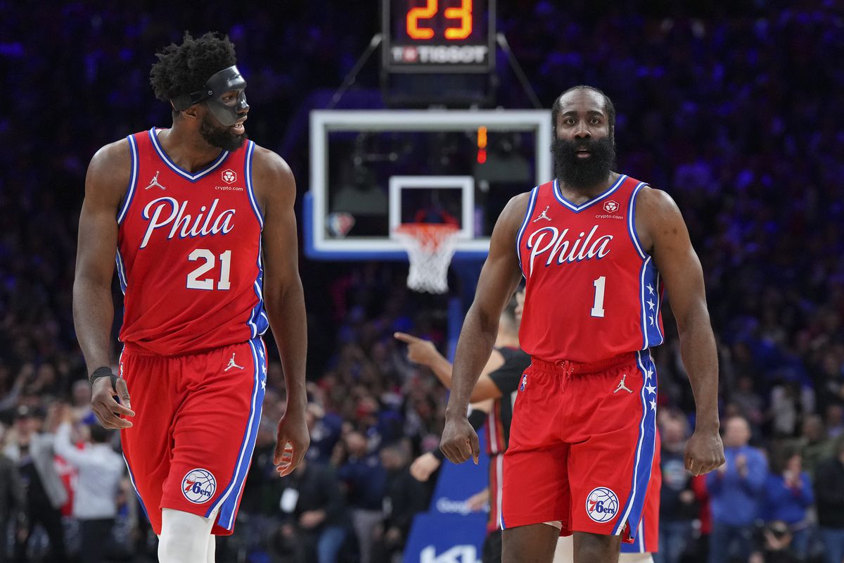 James Harden #1 and Joel Embiid #21 of the Philadelphia 76ers react against the Miami Heat during Game Four of the 2022 NBA Playoffs Eastern Conference Semifinals at the Wells Fargo Center on May 8, 2022 in Philadelphia, Pennsylvania.