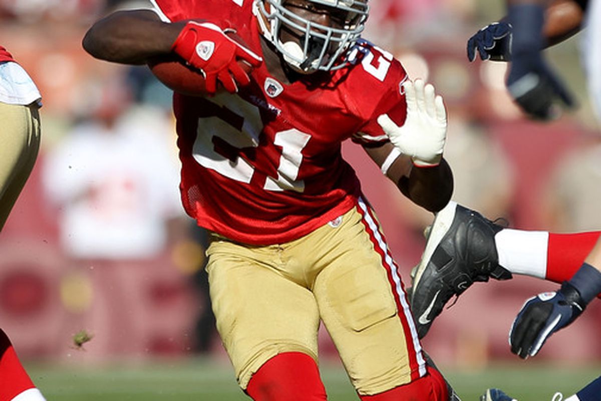 SAN FRANCISCO - NOVEMBER 14:  Frank Gore #21 of the San Francisco 49ers runs with the ball during their game against the St. Louis Rams at Candlestick Park on November 14 2010 in San Francisco California.  (Photo by Ezra Shaw/Getty Images)