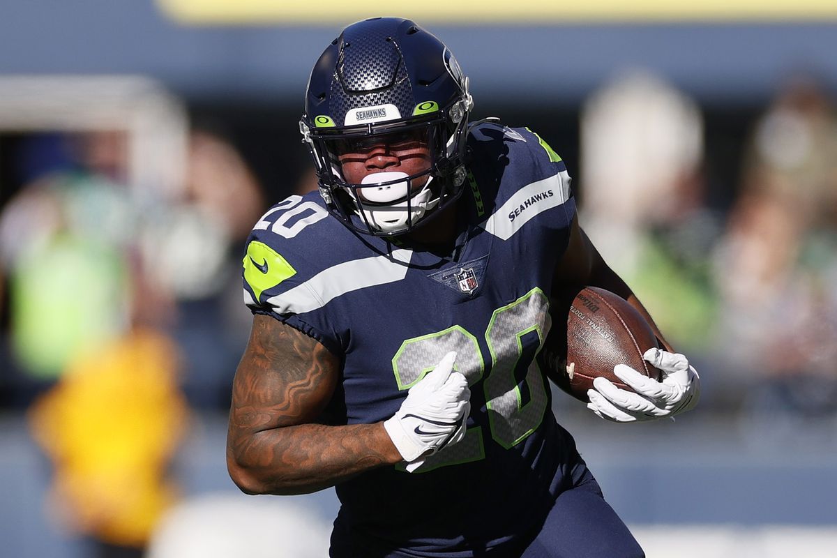 Rashaad Penny #20 of the Seattle Seahawks carries the ball against the Jacksonville Jaguars during the first quarter at Lumen Field on October 31, 2021 in Seattle, Washington.