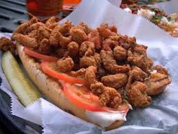A large hoagie is stuffed with fried crawfish