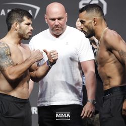 Raphael Assuncao and Rob Font square off at UFC 226 weigh-ins.