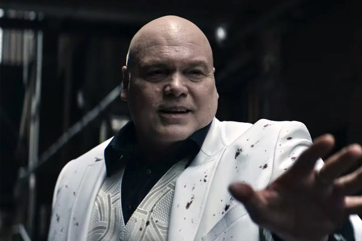 Wilson Fisk, the Kingpin, raises an open bloodied hand toward a young Maya Lopez, aka Echo, in a still from the first trailer for Marvel Studios’ Echo TV series.