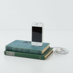 If you know she has the latest iPhone but also really likes vintage, present her with this <b>Rich Neely Designs</b> Vintage iPhone Book Charger, <a href="http://www.anthropologie.com/anthro/product/shopgifts-he-said/26074948.jsp">$68</a> at Anthropologie