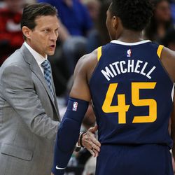 Utah Jazz head coach Quin Snyder talks to guard Donovan Mitchell (45) during the game against the Atlanta Hawks at Vivint Smart Home Arena in Salt Lake City on Tuesday, March 20, 2018.