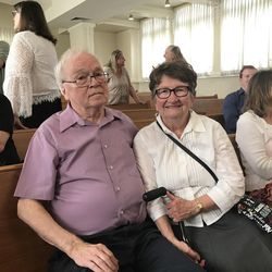 Ray and Darlene Cochran sit in a pew during an event celebrating the 100th anniversary of the Ogden LDS Deaf Branch. The Cochrans are longtime members of the branch and have served in various leadership positions over the years.
