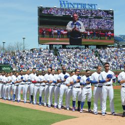 Cubs players line up for the national anthem. | Victor Hilitski/For the Sun-Times