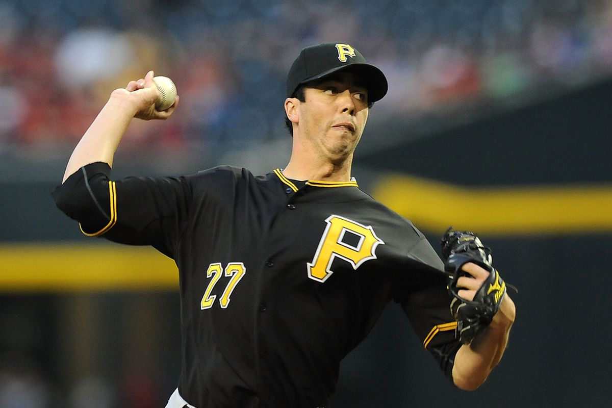 PHOENIX, AZ - APRIL 17:  Jeff Karstens #27 of the Pittsburgh Pirates delivers a pitch against the Arizona Diamondbacks at Chase Field on April 17, 2012 in Phoenix, Arizona.  (Photo by Norm Hall/Getty Images)