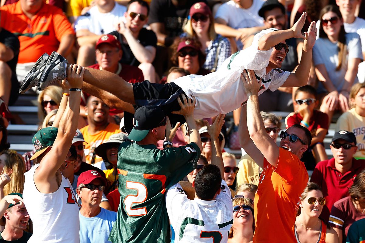 CHESTNUT HILL, MA - SEPTEMBER 01: Miami Hurricanes fans celebrate following a touchdown against the Boston College Eagles during the game on September 1, 2012 at Alumni Stadium in Chestnut Hill, Massachusetts.  (Photo by Jared Wickerham/Getty Images)