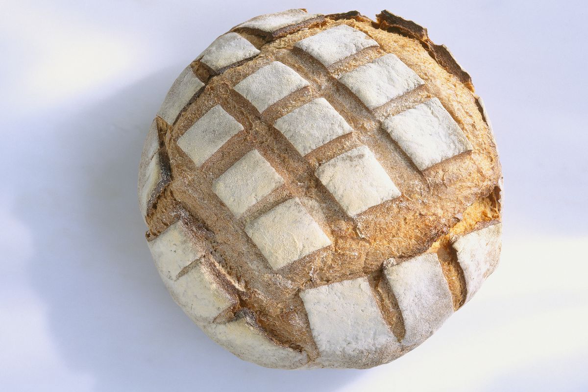 Sourdough loaf on plain b/g