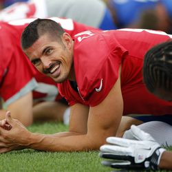 David Carr smiles during stretching. [Jim O'Connor-USA TODAY Sports]