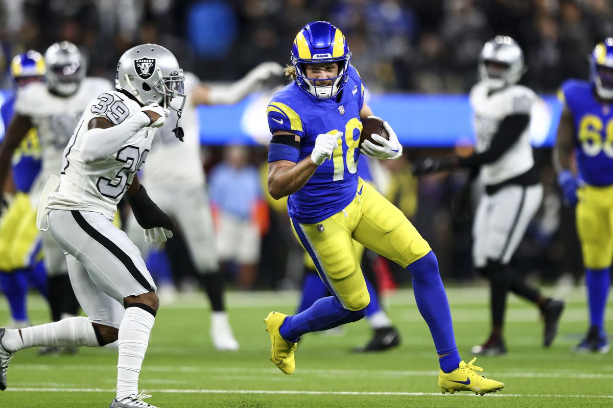 Ben Skowronek of the Los Angeles Rams carries the ball after a catch during an NFL football game against the Las Vegas Raiders at SoFi Stadium on December 8, 2022 in Inglewood, California.