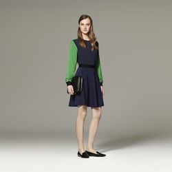 Pullover in Navy/Green, $34.99; Silky Skirt in Navy, $29.99; Pack-It-All Bag in Black, $34.99
