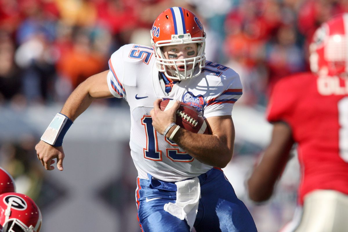 University of Florida’s Tim Tebow (15) rushes for a first do