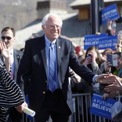 Democratic presidential candidate and Vermont Sen. Bernie Sanders, along with his wife, Jane, left, greets supporters before giving a speech at This is the Place Heritage Park in Salt Lake City, Friday, March 18, 2016.