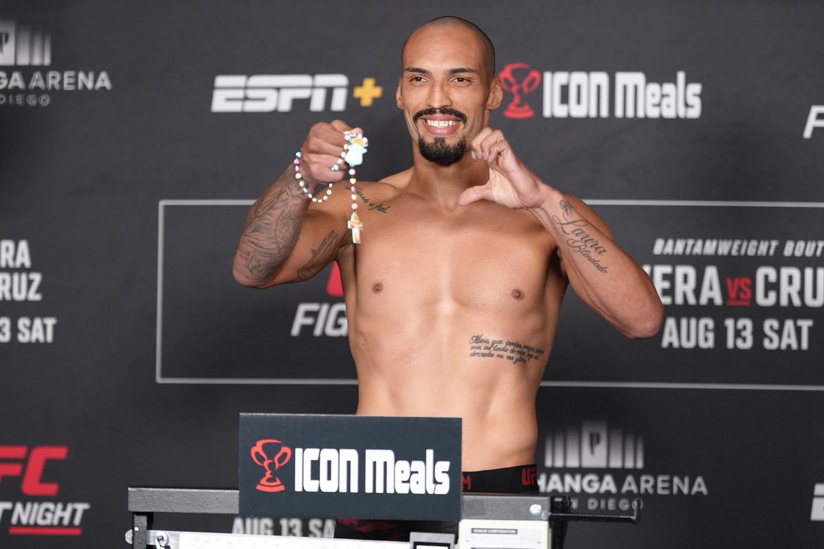 Bruno Silva of Brazil poses on the scale during the UFC Fight Night official weigh-in at the Sheraton San Diego Hotel and Marina on August 12, 2022 in San Diego, California.