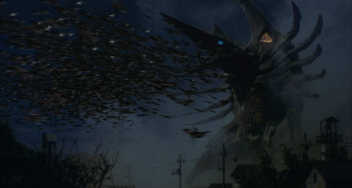 A still of Mother Legion shows it sending hundreds of its bug children out to attack
